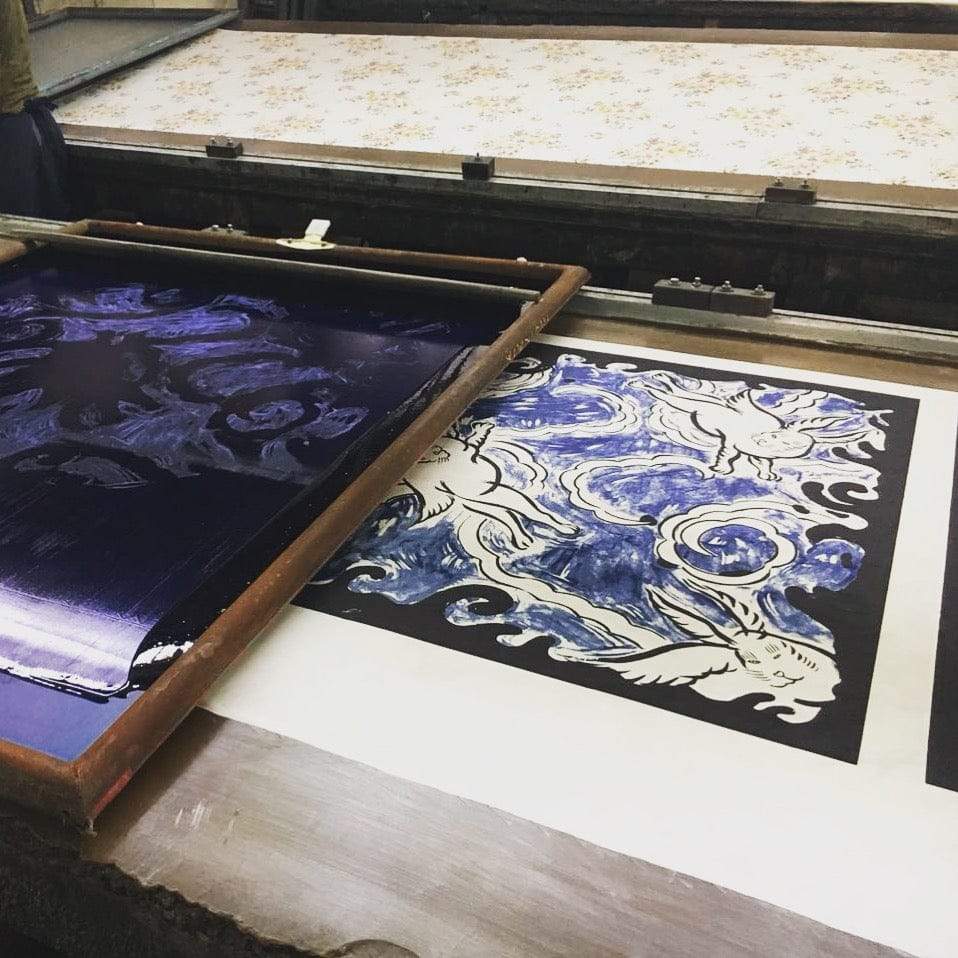 Photograph showing the screen printing workshop used in Delhi to produce the David Bowie limited edition silk scarves one by one using traditional artisanal techniques. Not mass produced. 